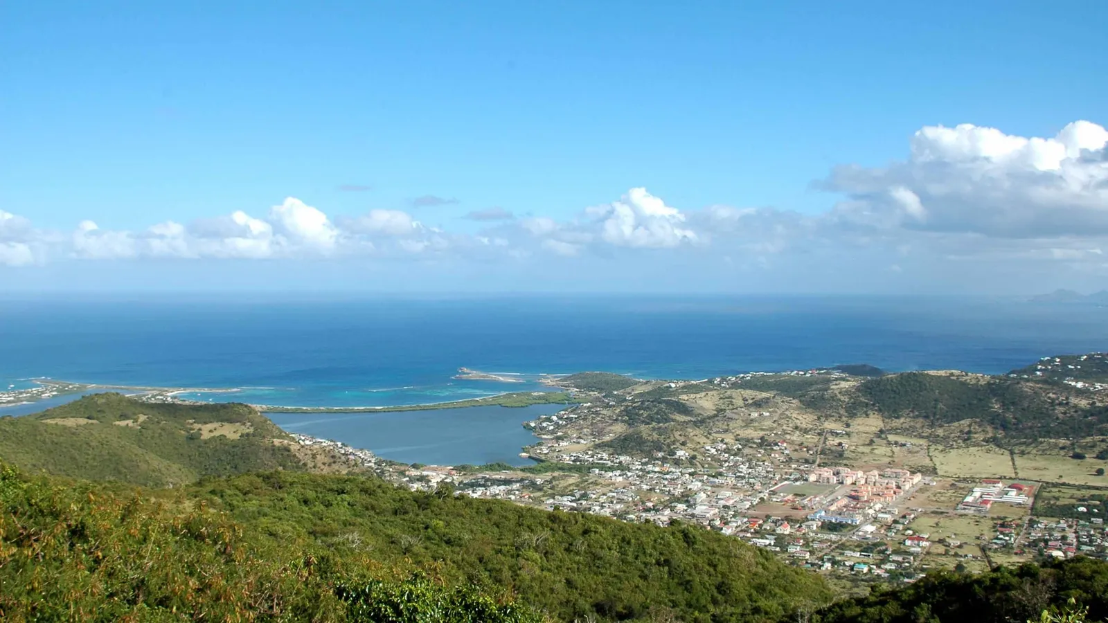 Panoramic view over the hills, lagoons and coast of Saint-Martin from the heights